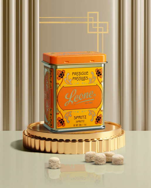 Orangefarbene Retro Dose mit Leone Pastillen im Apérol Spritz Geschmack