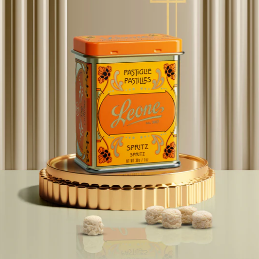 Orangefarbene Retro Dose mit Leone Pastillen im Apérol Spritz Geschmack