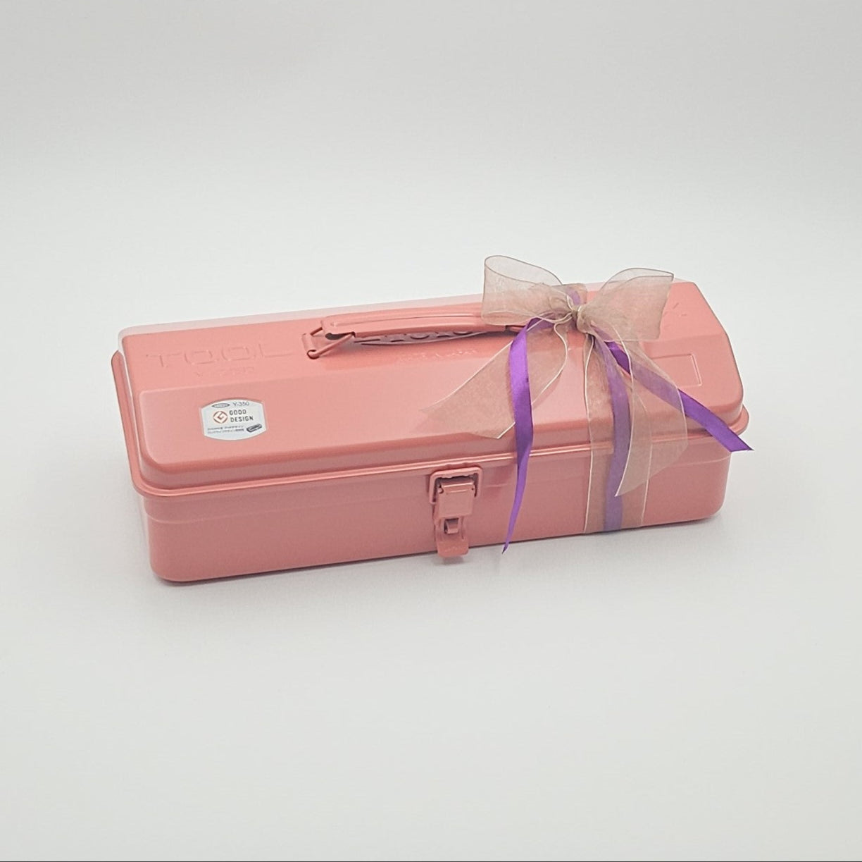 Coralfarbene Geschenkbox ‚Wohlfühlzeit‘ mit beiger Schleife