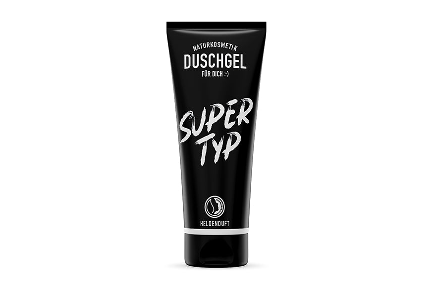Veganes Duschgel für Herren in einer schwarzen Tube mit der Nachricht ''Supertyp''