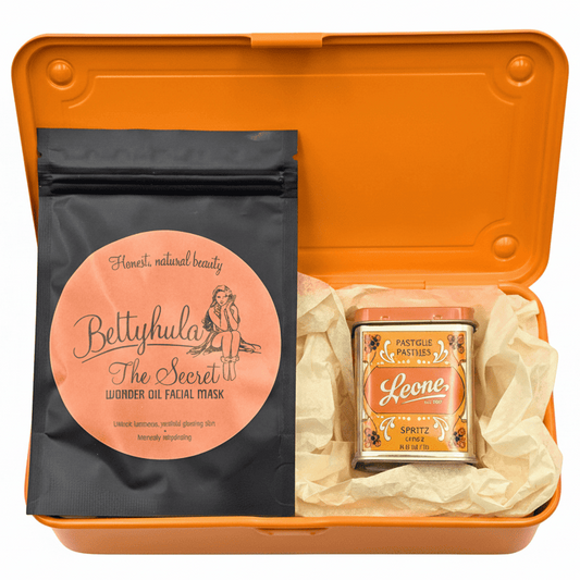 Süsse Treats und Self-care Produkte als Geschenk für sie – Bonbons, Gesichtsmaske und wiederverwendbare Metallbox