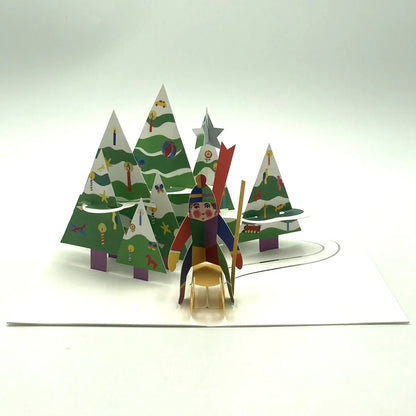 Pop-up Weihnachtskarte geöffnet – 3D-Schlittenfahrt durch einen festlichen Weihnachtswald mit lebendigen Details