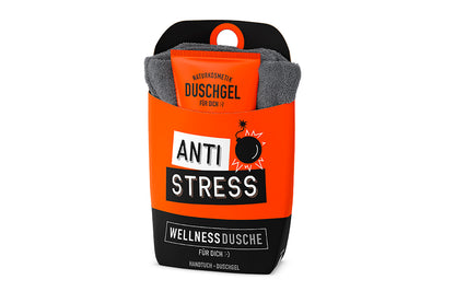 Veganes Duschgel und Baumwoll-Handtuch als Geschenkset für Männer in oranger Verpackung