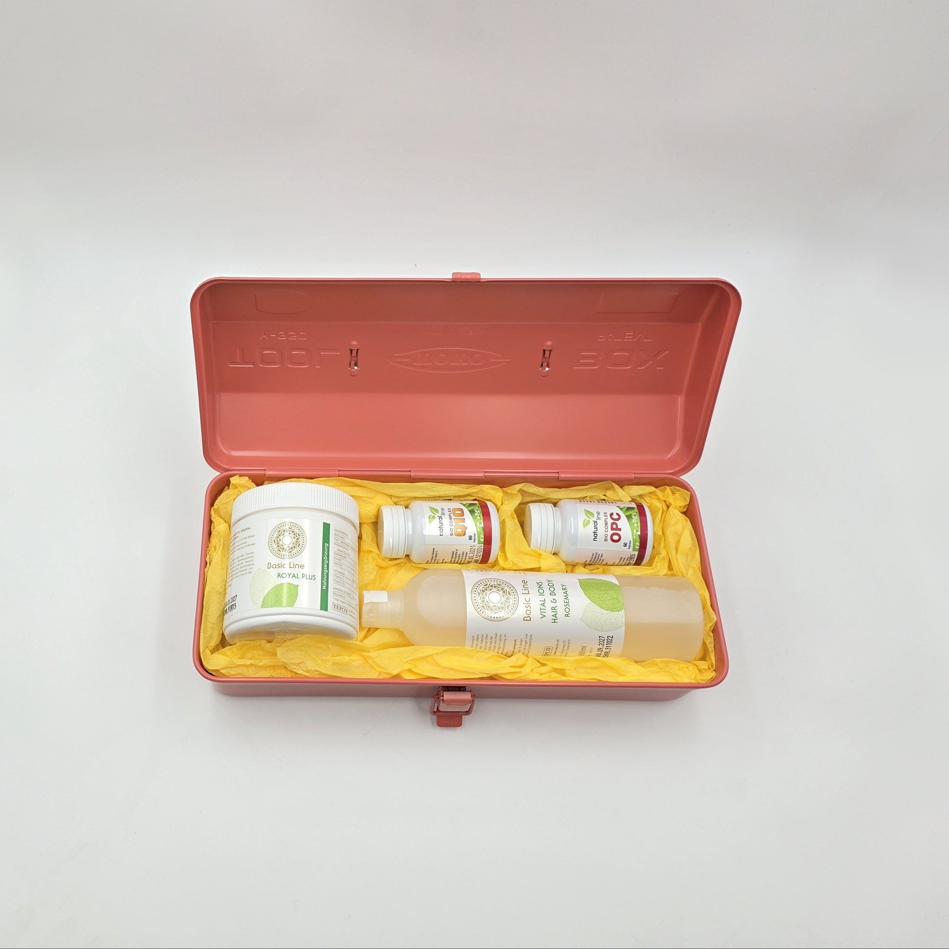 Offene coralfarbene Geschenkbox Royal Coral mit Royal Plus, Q10, OPC und Hair & Body Rosmarin.