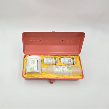 Offene coralfarbene Geschenkbox Royal Coral mit Royal Plus, Q10, OPC und Hair & Body Rosmarin.